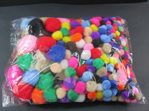 Assorted colorful pom poms in various sizes for DIY crafts, featuring 400 lightweight and soft pieces for endless creativity.