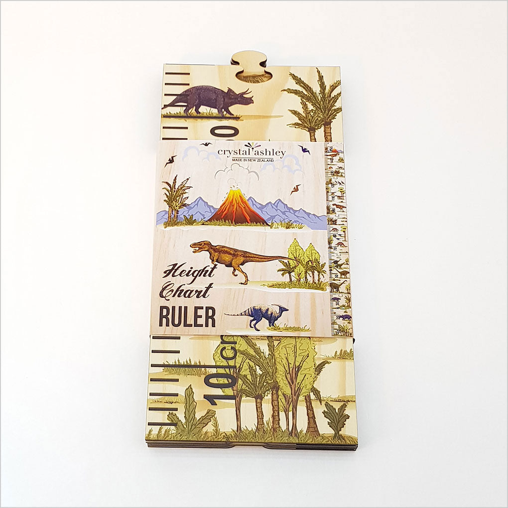 Dinosaur-themed growth chart ruler for kids, made of eco-friendly pine with vibrant colors and puzzle pieces for added fun.