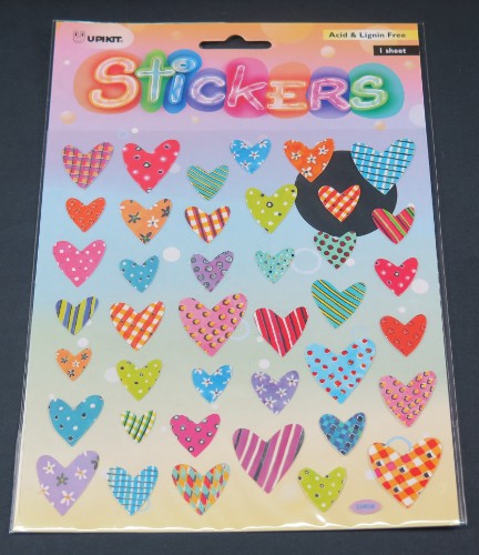 Vibrant heart sticker made from durable vinyl, perfect for personalizing laptops, notebooks, and more.