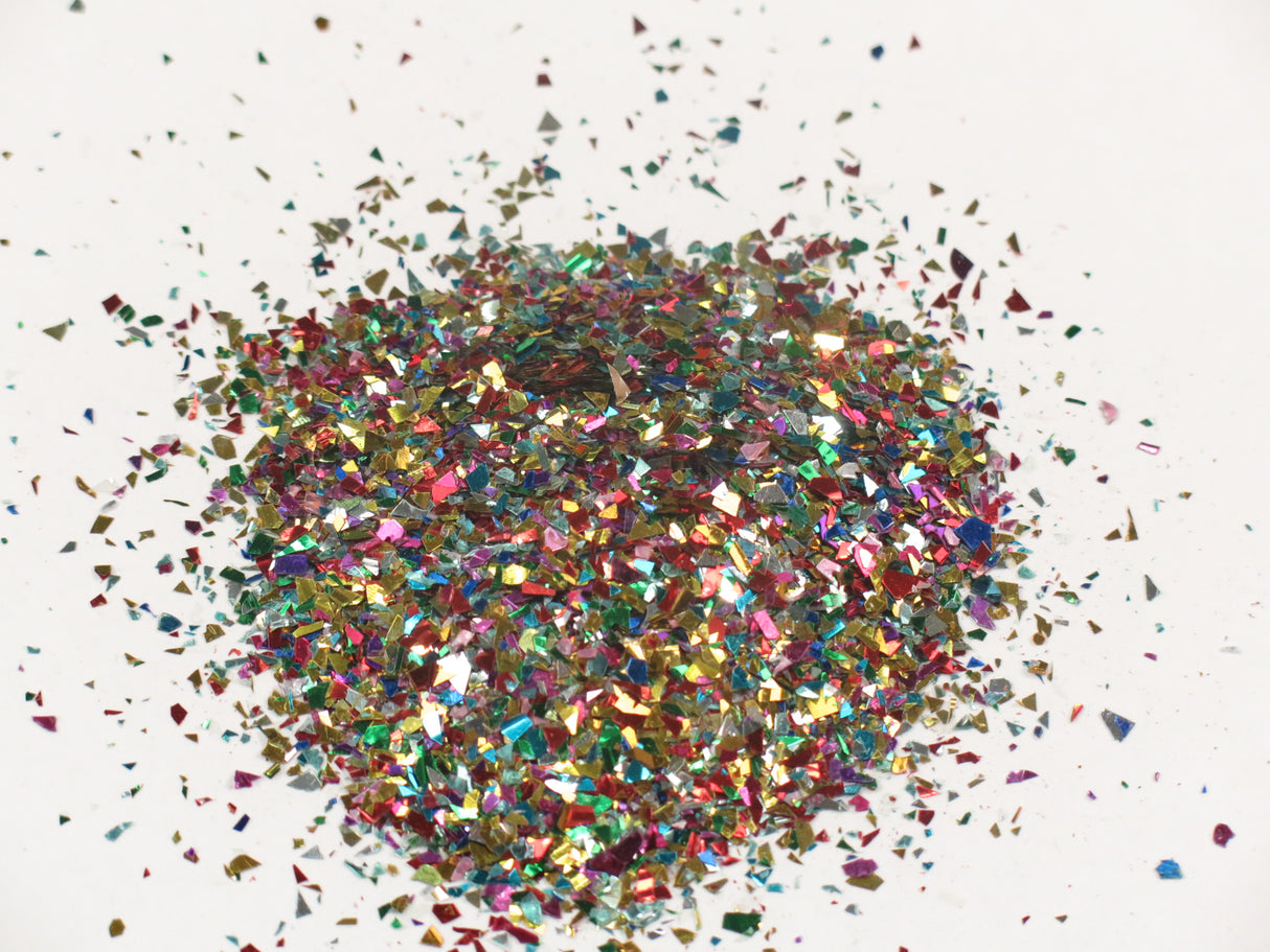 Vibrant 1kg bag of mixed confetti glitter, perfect for crafts, parties, and DIY projects with various shimmering colors.