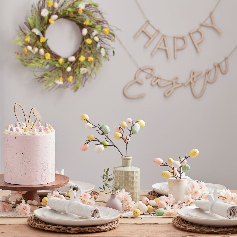Pastel speckled egg stems for Easter decor, 5 artificial twigs in a vibrant arrangement, perfect for centerpieces.