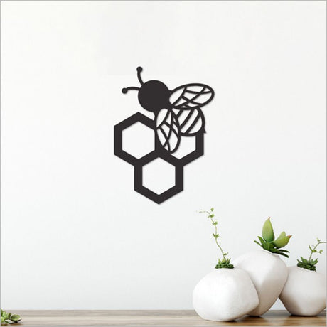 Elegant black acrylic bee wall art, 12.6 cm, perfect for modern decor in any room.