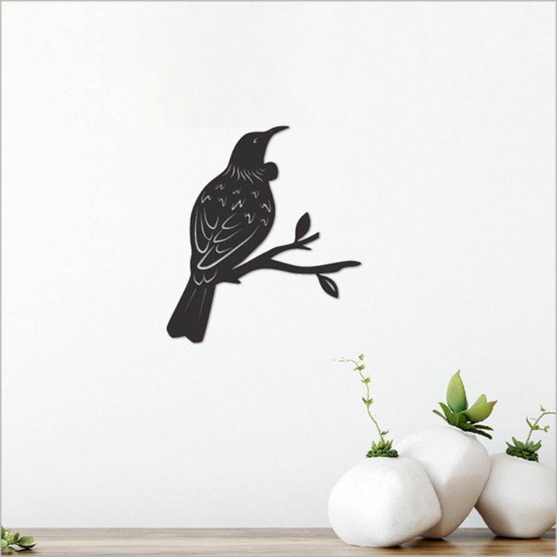 Black acrylic tui wall art measuring 11.6cm, showcasing a sophisticated silhouette for modern home decor.