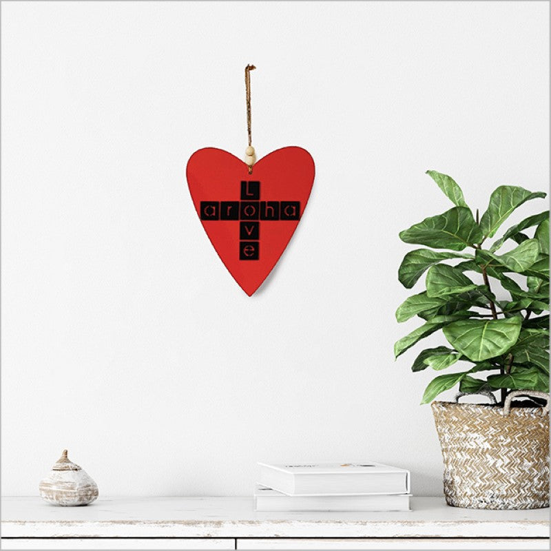 Heart-shaped Kiwiana wall art in black acrylic, symbolizing love and Aroha, perfect for home decor.