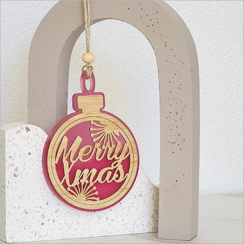Pink satin acrylic hanging ornament with laser-cut bamboo base, perfect for festive decor and gift giving.