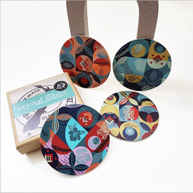 Stylish coasters featuring Pacific-themed prints, made of acrylic with a cork base, perfect for protecting surfaces.