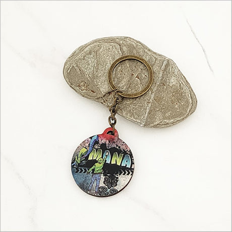 Lightweight printed pine veneer keychain featuring unique grafiti design, celebrating Kiwiana style and functionality.