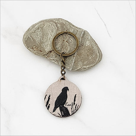 Kea + Toi Toi printed keychain in lightweight pine veneer, championing Kiwiana culture with charm and practicality.