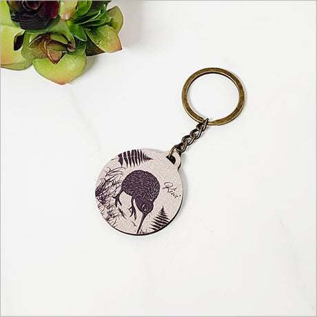 Stylish Kiwi+Fern keychain made from eco-friendly pine veneer, perfect for showcasing New Zealand roots.