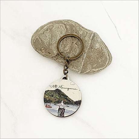 Lightweight pine veneer keychain featuring Mount Maunganui, perfect for Kiwiana lovers and practical key organization.