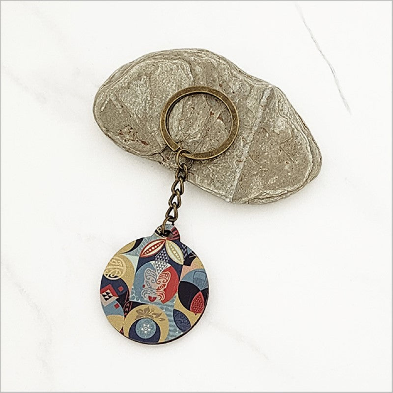 Laser-cut Pacific Fusion 1 keychain in lightweight pine veneer, featuring Kiwiana design, perfect for keys or gifts.