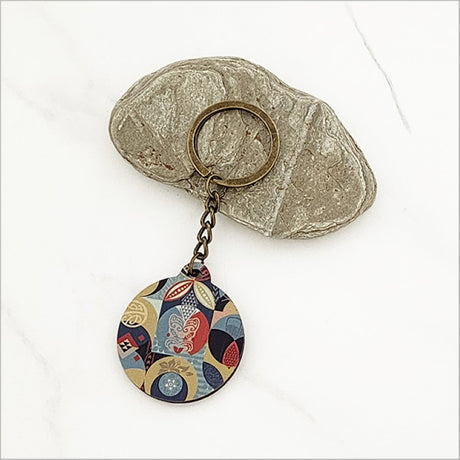 Laser-cut Pacific Fusion 1 keychain in lightweight pine veneer, featuring Kiwiana design, perfect for keys or gifts.