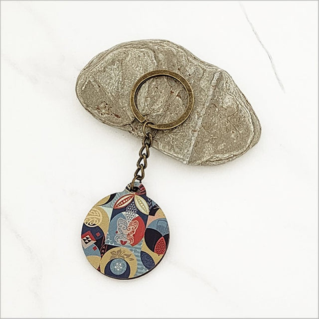 Laser-cut Pacific Fusion 1 keychain in lightweight pine veneer, featuring Kiwiana design, perfect for keys or gifts.