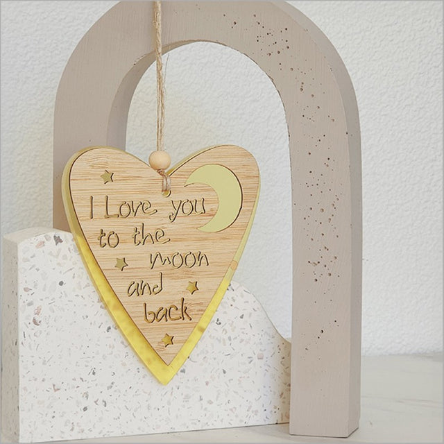 Yellow satin acrylic heart and moon hanging ornament, lightweight and elegantly crafted for home decor or gifting.