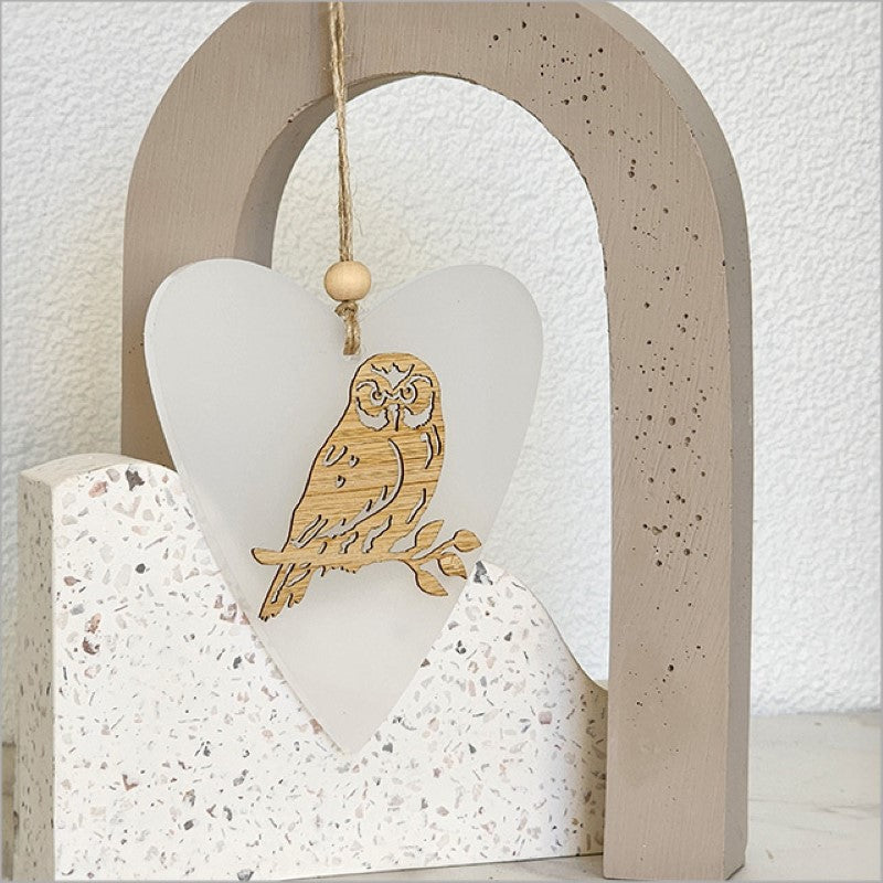 Elegant white satin acrylic heart ornament, lightweight and ready to hang, perfect for holiday decor or thoughtful gifting.