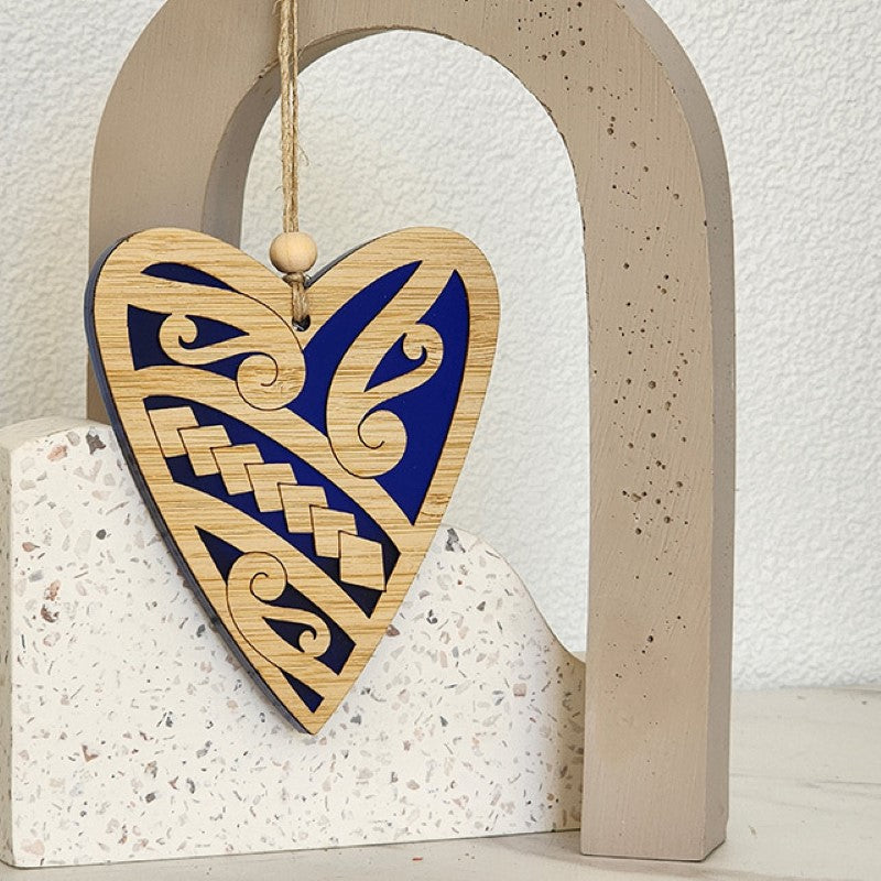 Elegant heart-shaped blue satin acrylic ornament, featuring laser cut bamboo, perfect for holiday decor or gifts.
