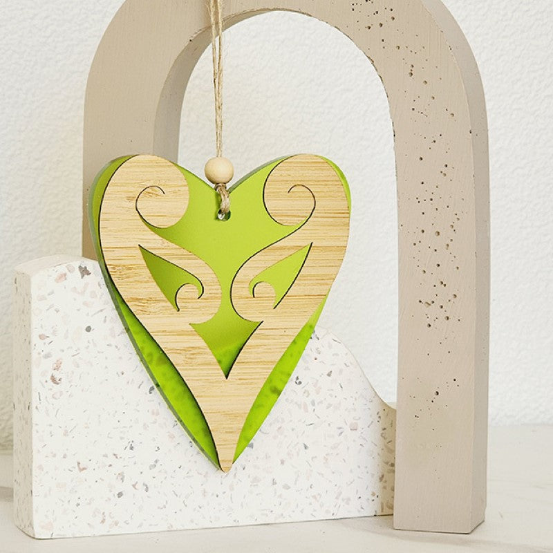 Lime satin acrylic Koru heart ornament, 90mm x 105mm, symbolizing new beginnings and perfect for gifting or décor.
