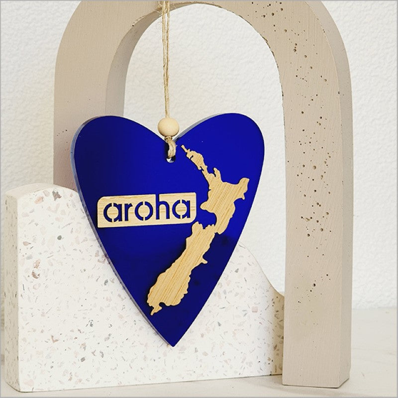 Blue satin acrylic heart ornament, expertly laser cut, perfect for home decor or thoughtful gifting.