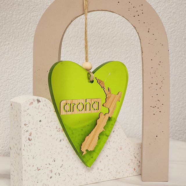 Vibrant lime satin acrylic heart ornament, 90mm x 105mm, a perfect decorative piece symbolizing love and creativity.
