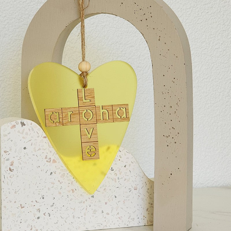 Yellow satin acrylic heart ornament with laser-cut bamboo, perfect for hanging and gifting.