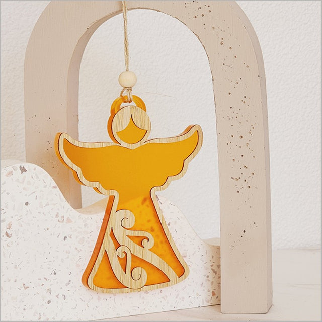 Vibrant orange satin acrylic angel ornament with intricate laser cut details, perfect for holiday decor and gifting.