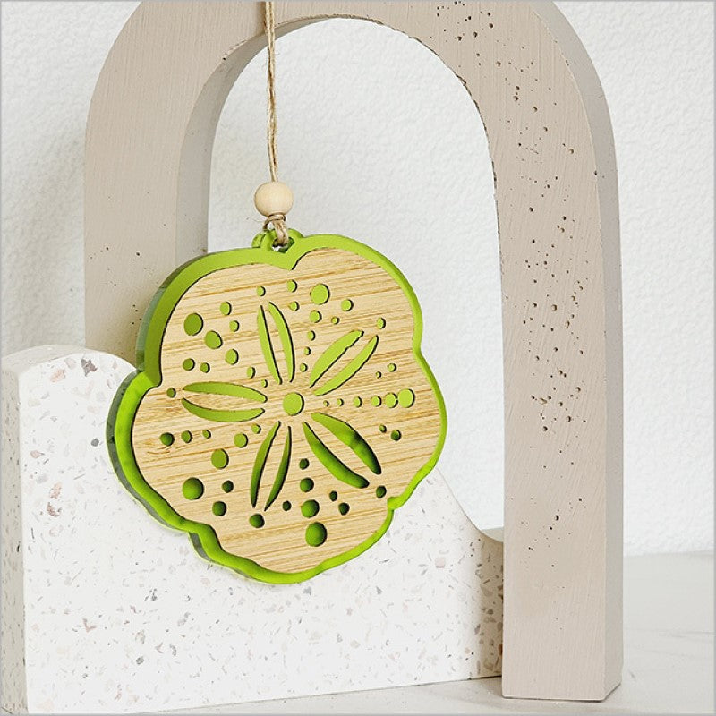 Lime satin acrylic hanging ornament featuring laser-cut bamboo, perfect for festive decor and eco-friendly gifting.