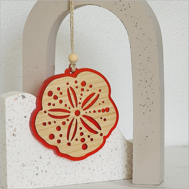 Vibrant red satin acrylic hanging ornament in a unique design, measuring 87mm x 105mm, perfect for festive decor.