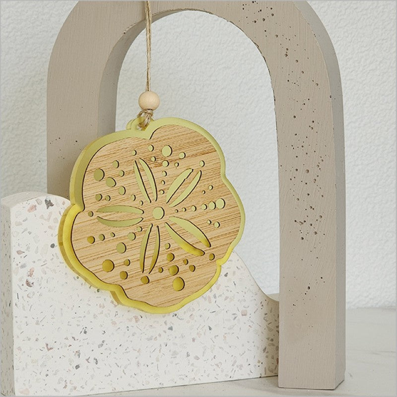 Yellow satin acrylic hanging ornament with laser-cut bamboo, ideal for home decor or as a thoughtful gift.