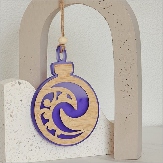 Purple satin acrylic hanging ornament featuring intricate laser-cut bamboo designs, perfect for holiday decor.