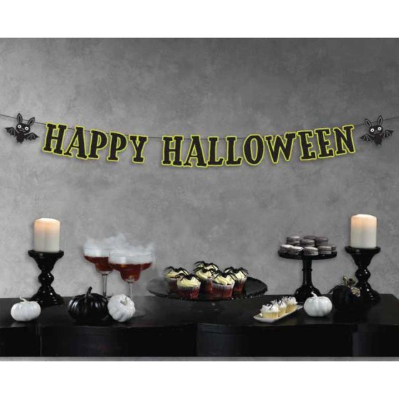 Colorful 'Happy Halloween' banner with playful bats, perfect for festive decorations and gatherings.