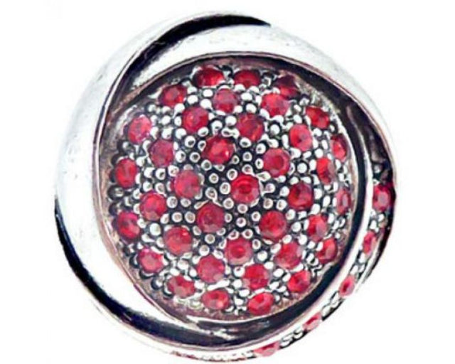 Vibrant red swirl snap jewelry, perfect for elevating personal style and complementing various outfits.