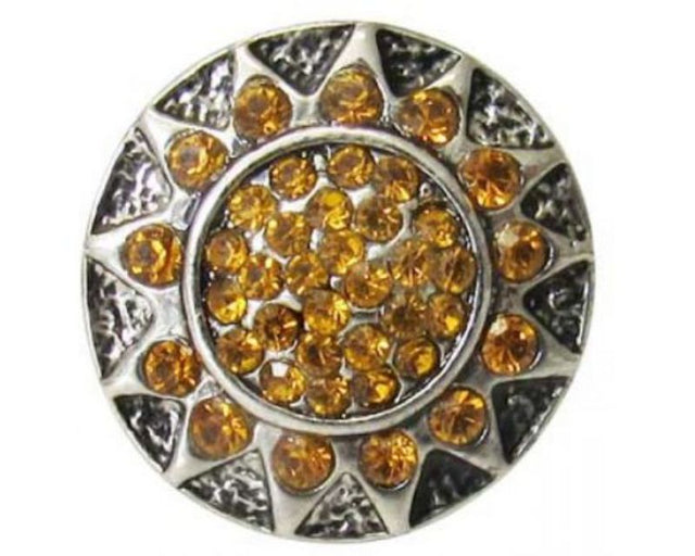 Golden Aztec Sun snap featuring intricate ancient designs, a stylish accessory inspired by Aztec heritage.