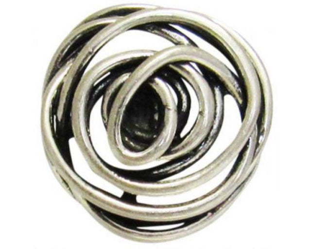 Antique silver flower snap jewelry with intricate detailing for versatile style and comfortable wear.