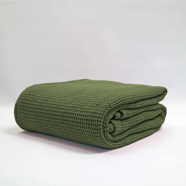 Large olive stonewashed blanket with deep waffle texture, made from OEKO-TEX® certified cotton by Baksana.