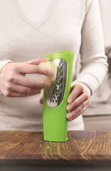 Zeal Tower Grater in red or green, compact design for mess-free grating and easy cheese pouring directly onto dishes.