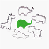 Set of 5 jungle animal metal cookie cutters: lion, elephant, monkey, giraffe, and zebra for fun baking adventures.