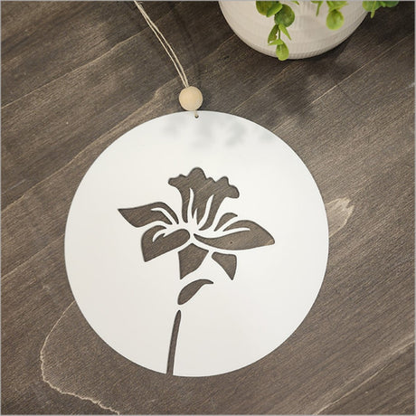 Stylish white acrylic circle wall art featuring a delicate daffodil design for modern home decor.