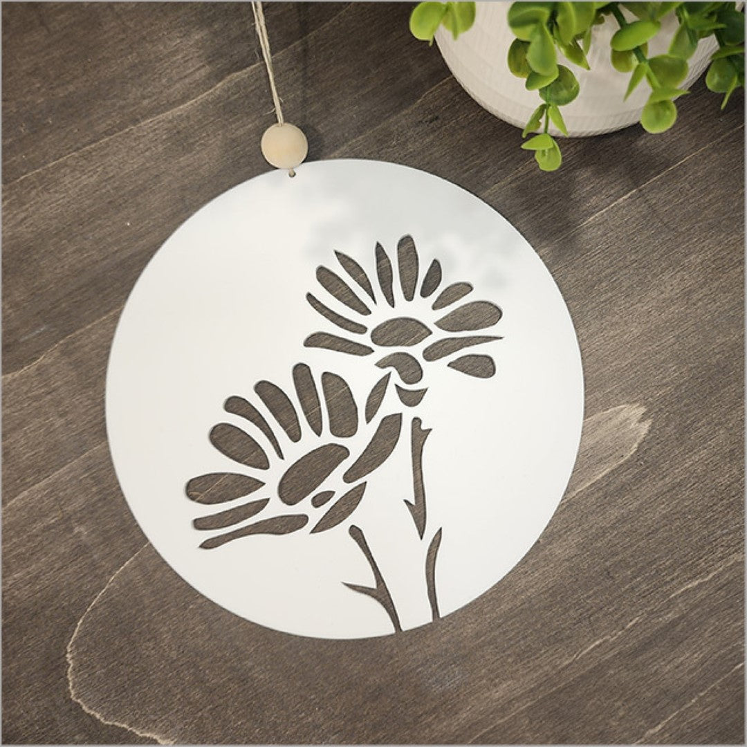 White acrylic circular wall art featuring a daisy design, perfect for modern home decor and easy to hang.