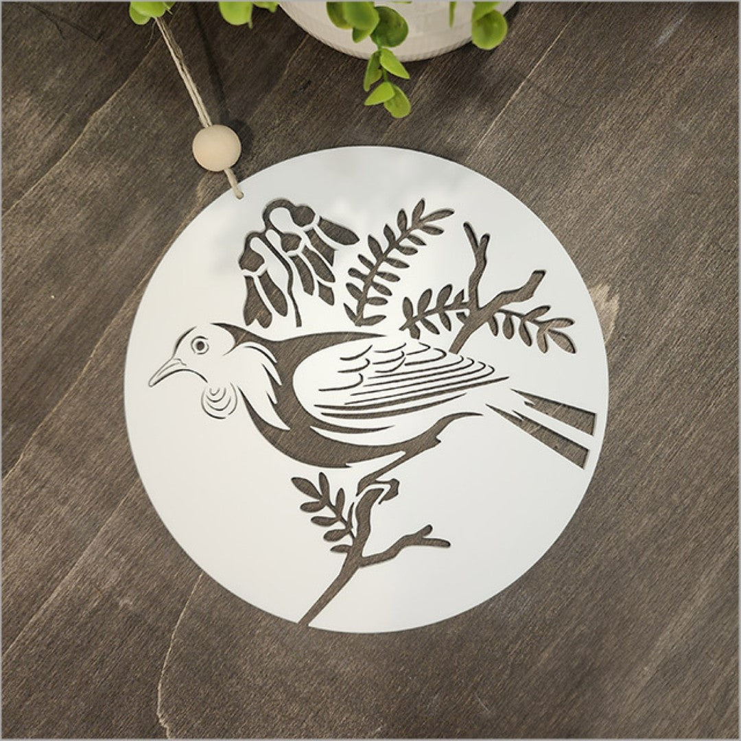 Stylish white acrylic wall art featuring a tui bird, perfect for Kiwiana-inspired home decor.