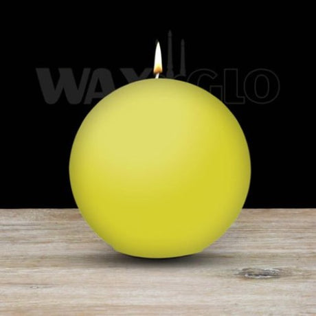 Vibrant yellow 100mm ball candle by Waxglo, adds elegance and warm ambiance for celebrations and home decor.