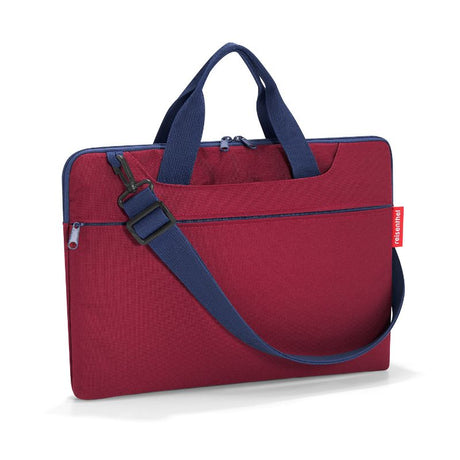 Stylish Reisenthel Netbook Bag in Dark Ruby, designed for notebooks up to 15.6 inches, with padded compartments and multiple pockets.