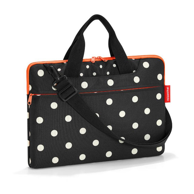 Stylish Reisenthel netbook bag in Mixed Dots, padded for 15.6-inch notebooks with multiple pockets and adjustable strap.