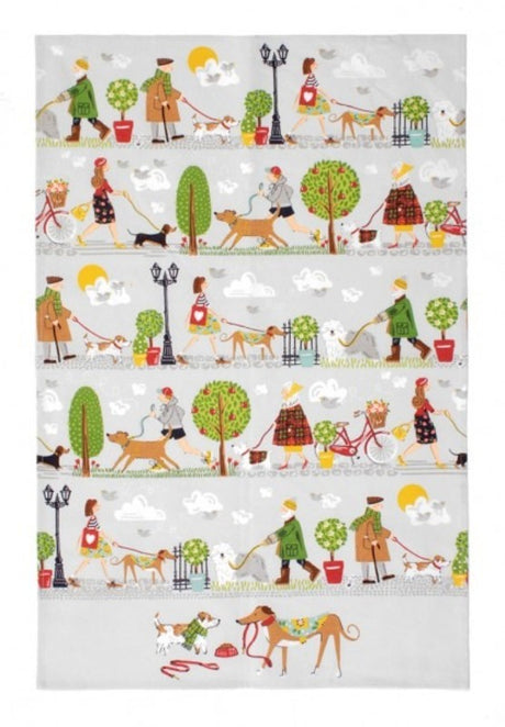 Ulster Weavers Cotton Walkies Tea Towel featuring playful dog designs, vibrant colors, and high-absorbency cotton fabric.
