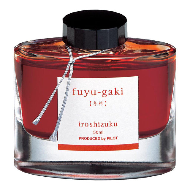 Pilot Iroshizuku 50ml Winter Persimmon ink in a stylish glass bottle, perfect for calligraphy and artistic writing.