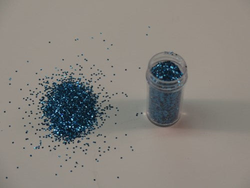 Vibrant baby blue glitter in 1kg, perfect for adding shimmer to crafts, scrapbooking, and cake decorating.