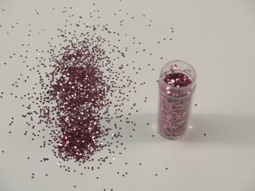 Vibrant 1kg pink glitter for crafts, party decor, and DIY projects, ensuring eye-catching sparkle and easy application.