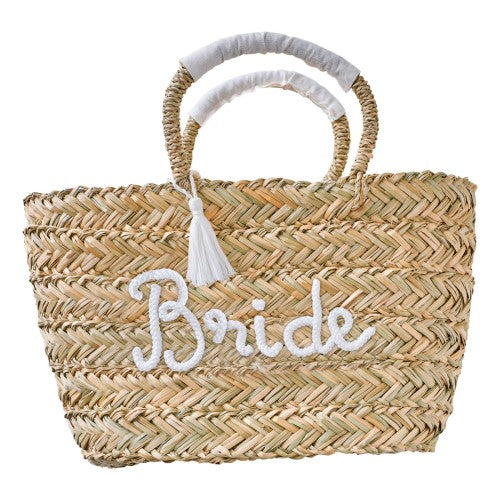 Stylish rattan bag for brides, featuring 'Bride' lettering and tassels, perfect for hen parties and celebrations.