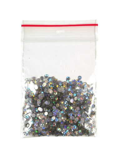 Holographic Glitter Dots in various sizes, perfect for DIY crafts and embellishments with a radiant light-reflecting effect.