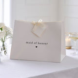 Elegant Modern Luxe Maid of Honour Gift Bag with off-white ribbon, tissue paper, and card tag for special occasions.