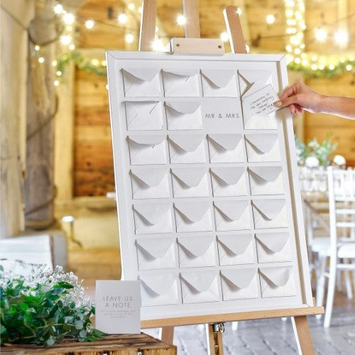 Rustic Romance Guestbook featuring a wooden frame, envelopes, and cardlets for heartfelt guest messages at weddings.
